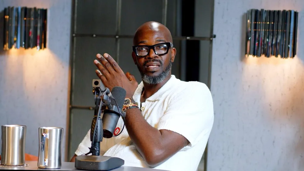 Black Coffee speaking during an interview